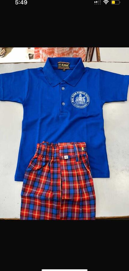 Blue polo T shirt with monogram and red checked shorts