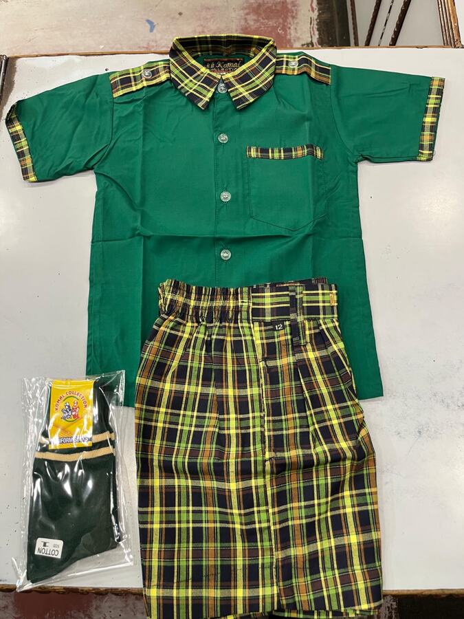Green school shirt with yellow checked shorts and socks