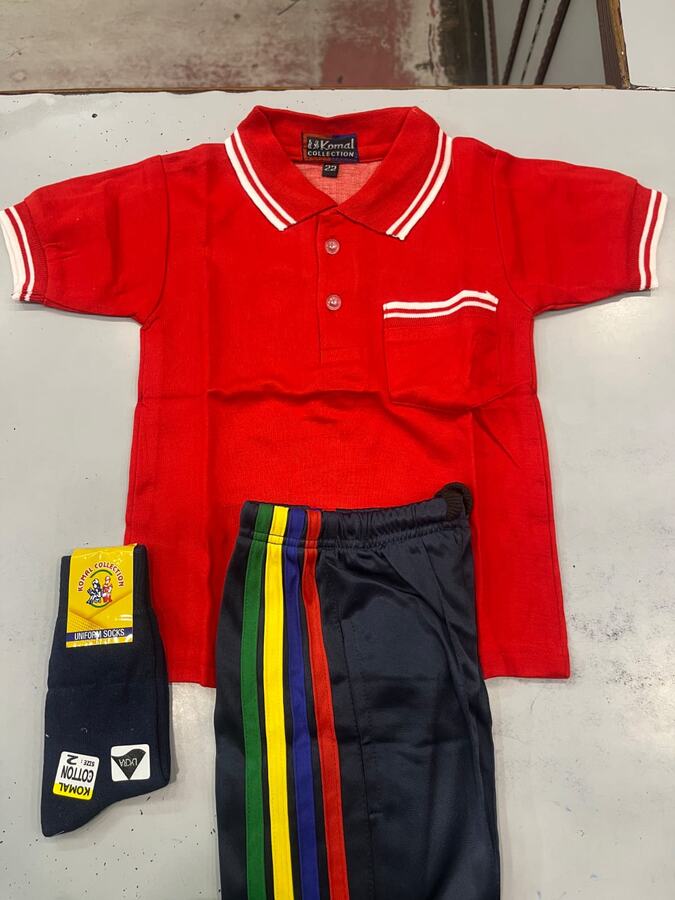 Red polo T shirt with striped track pants and socks